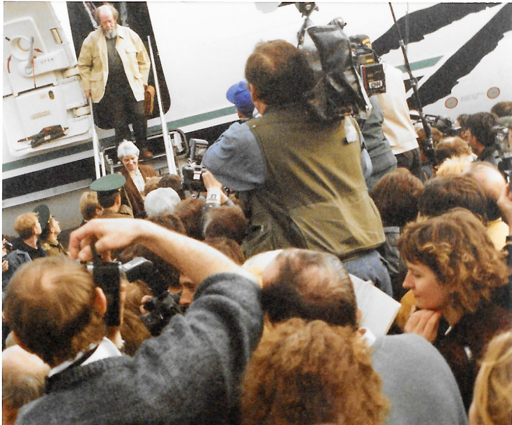 Alexandr Solzhenitsyn and his wife Natalia Dmitriyevna Solzhenitsyn exiting from Alaska Airlines plane upon their arrival on May 27, 1994 in Vladivostok as they returned from exile in the United States. Photo by Ted Lipien.